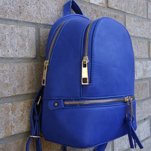 Mini backpack purse with gold tone zippers. main image 16